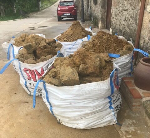 recogida de sacas como servicio de construcción